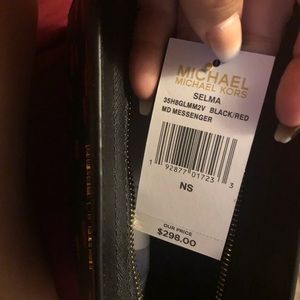 A beautiful black and red Michael Kors